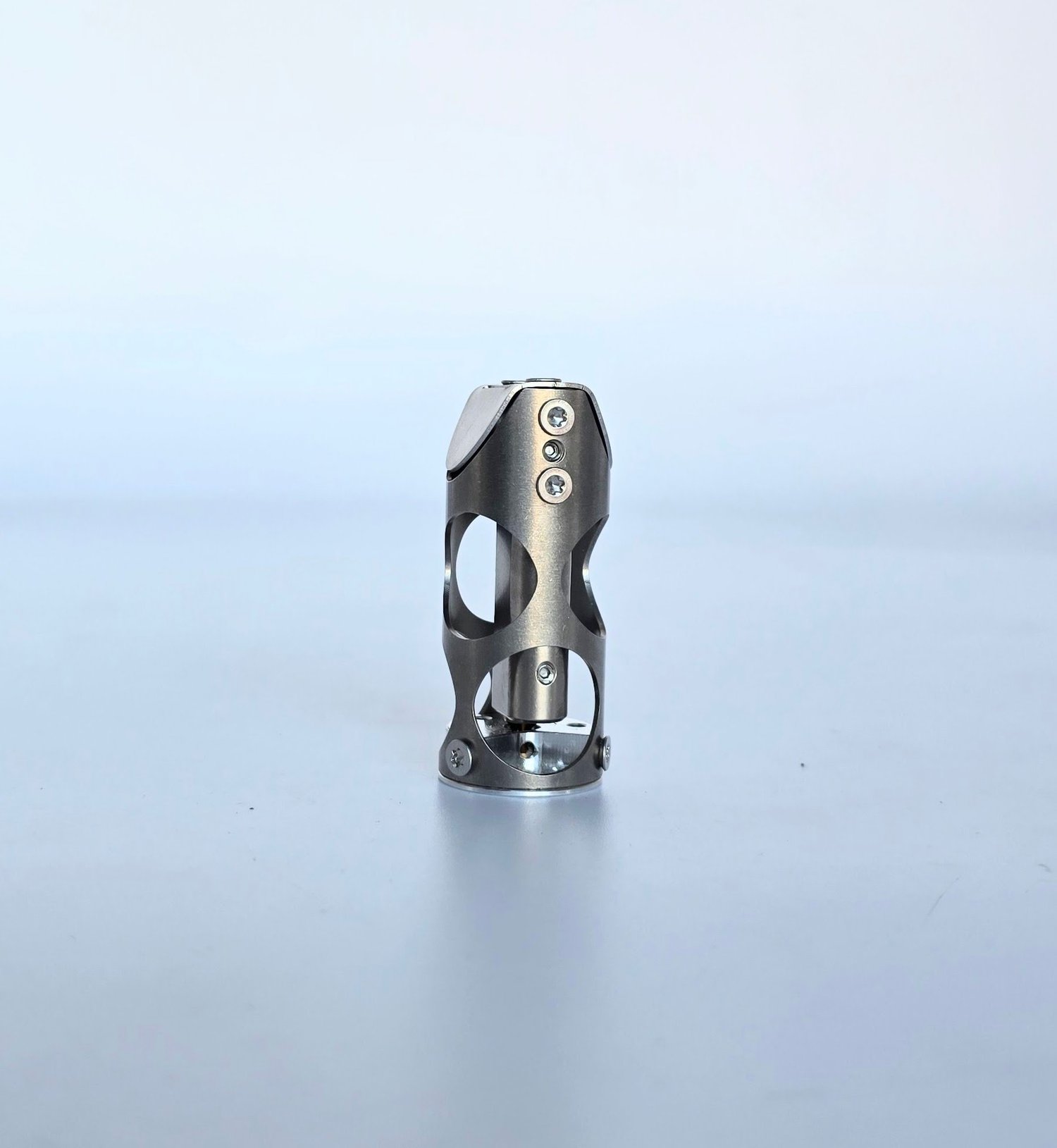 A Chube Conduction standing upright on a plain white surface against a gradient background.